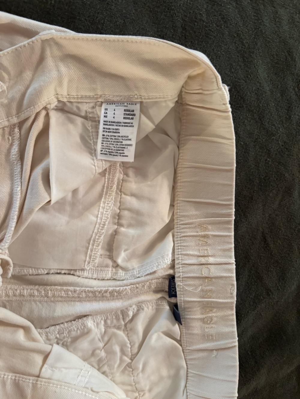 American Eagle Cream wide leg pant. Elastic Waistband with button&hook closure